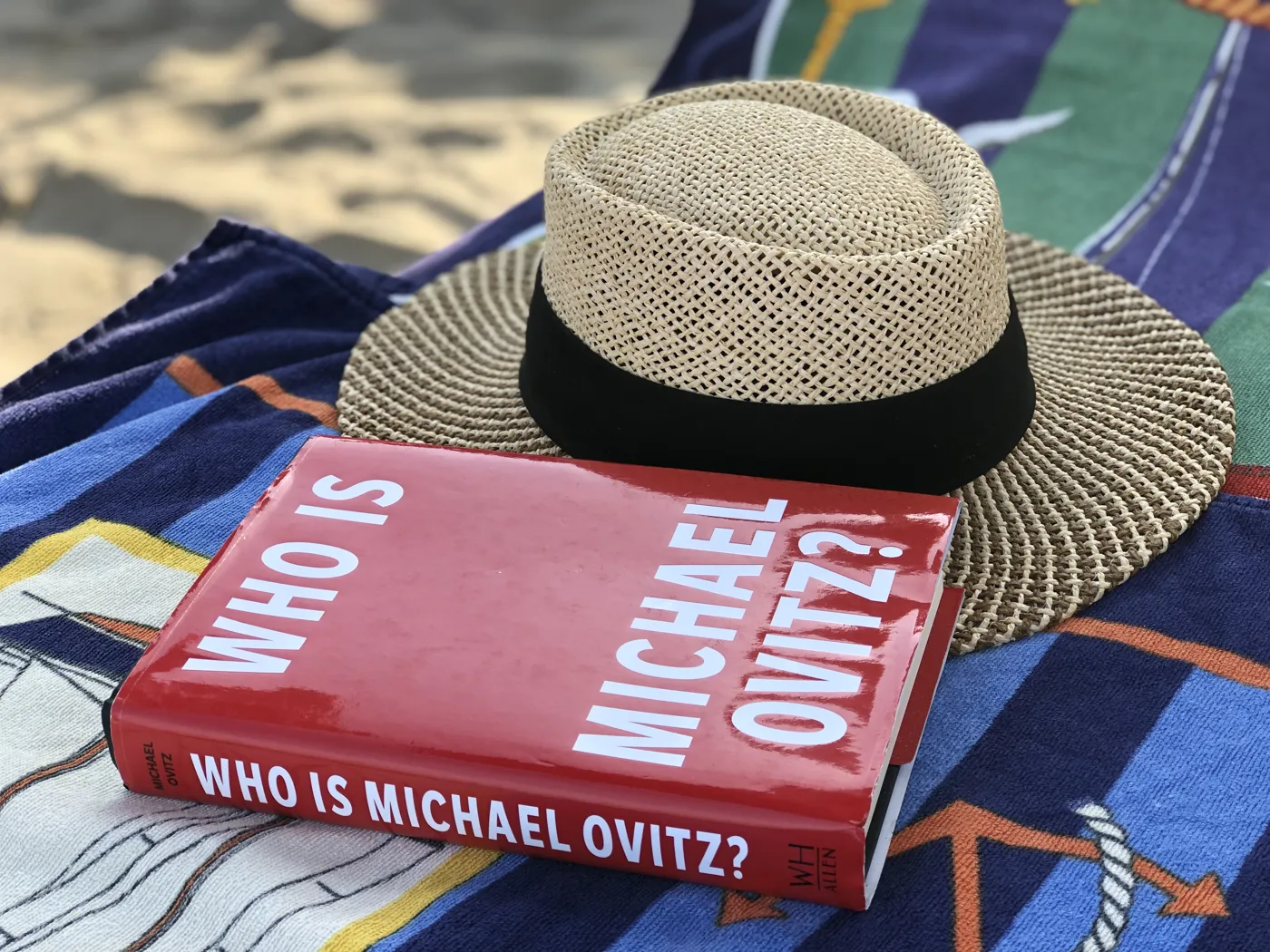 Who Is Michael Ovitz? and a straw Panama hat, seen from the spine
