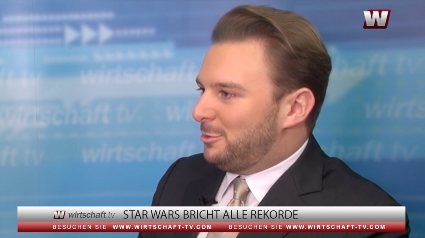 Tobias Jaeger answering a question in the Wirtschaft TV studio