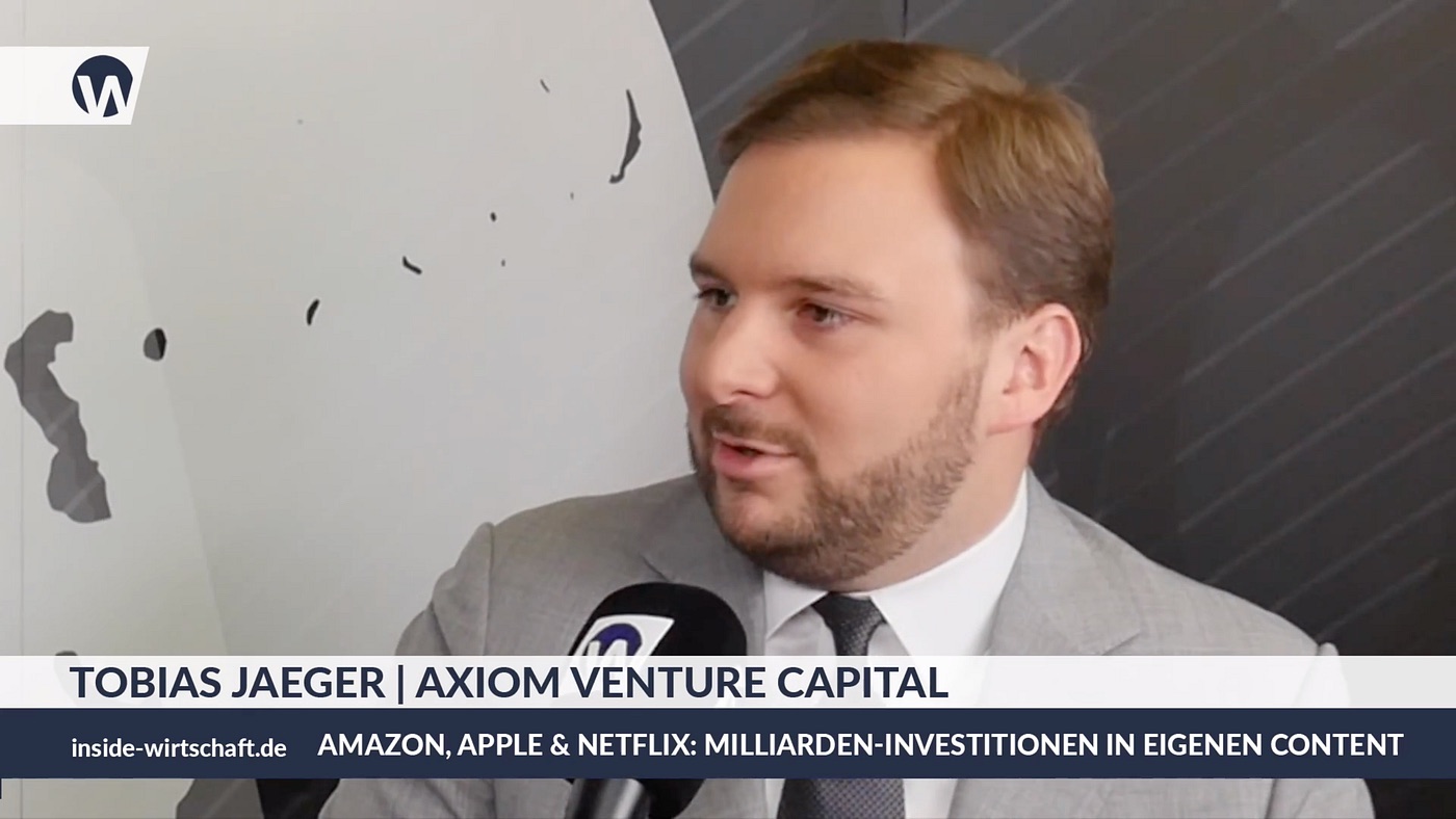 Tobias Jaeger speaking, with the caption Tobias Jaeger, AXIOM Venture Capital